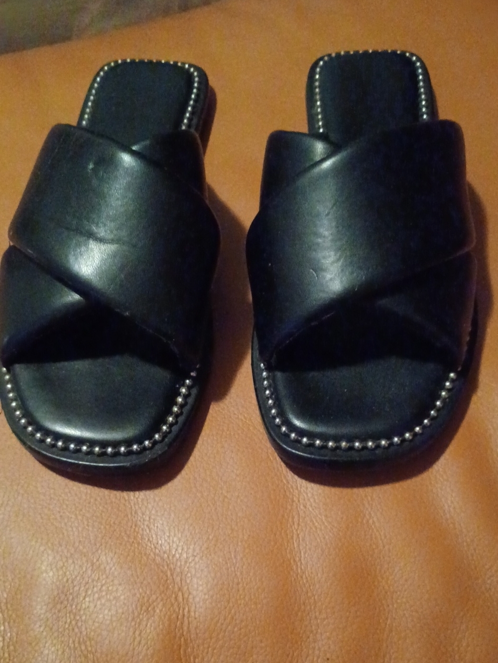 << BCBGeneration Black Faux Leather Crisscross Slide Sandals with Stud Trim 9.5